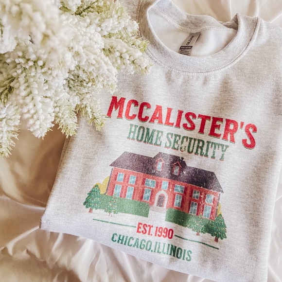 McCalister’s Home Security Crewneck Sweater - Picture 1 of 1